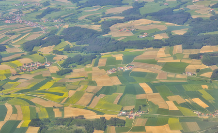 Aerial view over villages in spring time