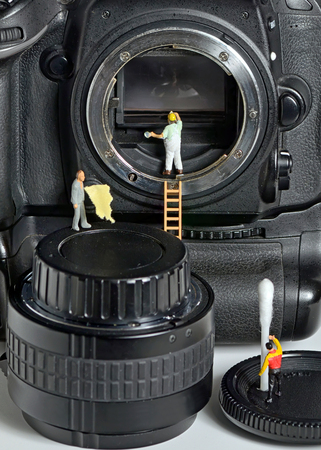 Camera sensor cleaning by figurinesの写真素材