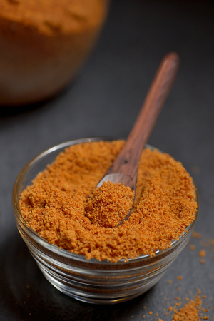 Coconut palm sugar on ardesia plateの写真素材