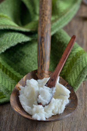 coconut oil on the wooden spoonの写真素材