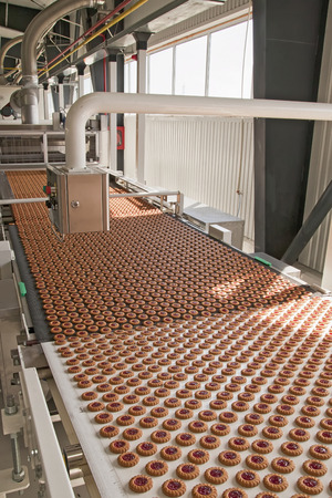 Production of cookies on conveyorの写真素材