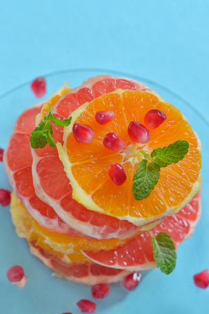 Fresh mixed slices of citrus fruitの写真素材