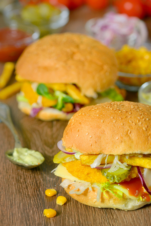 Homemade burger on the wooden tableの写真素材
