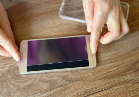 Kit of  installing safety glass on smartphoneの写真素材