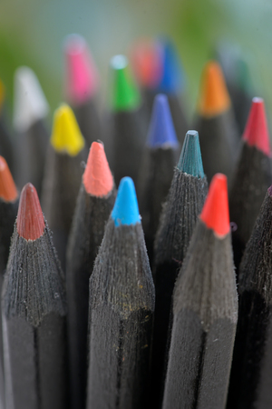 Colored  black pencils in jarの写真素材