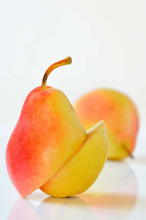 Sliced Ripe Pear Isolated on Whiteの写真素材