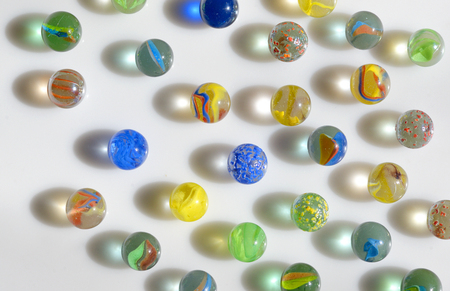 Glass marble balls and shadowsの写真素材