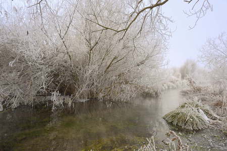 Winter frozen on morning riverの写真素材