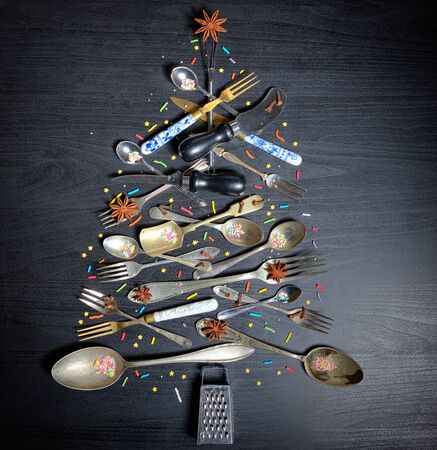 Kitchen Utensil Christmas Tree on black tableの写真素材