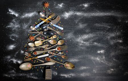 Kitchen Utensil Christmas Tree on black tableの写真素材