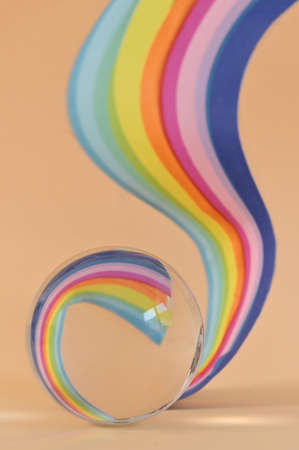 A Glass Round Ball and Paper Rainbow reflexionの写真素材