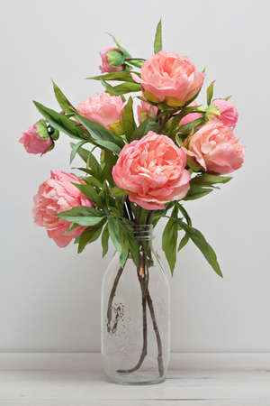 Closeup Beautiful Pink Peony Flowers in Vaseの写真素材