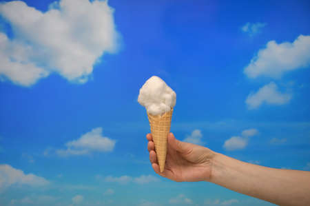 Concept Ice cream cone and Cotton like Cloudsの写真素材