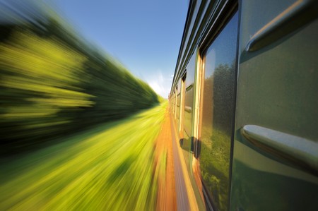 Fast riding a train passenger with motion blur の写真素材