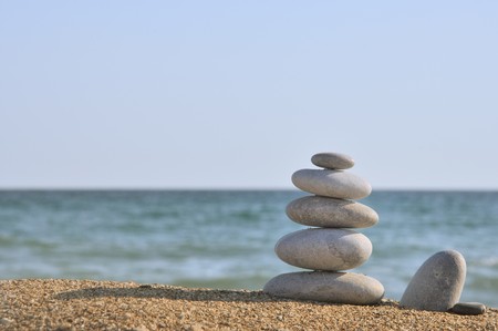 Differently sized and colored pebbles, stackedの写真素材