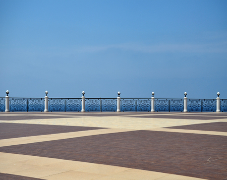 Balcony Near Sea Under Deep Blue Sky And Cloudsの写真素材