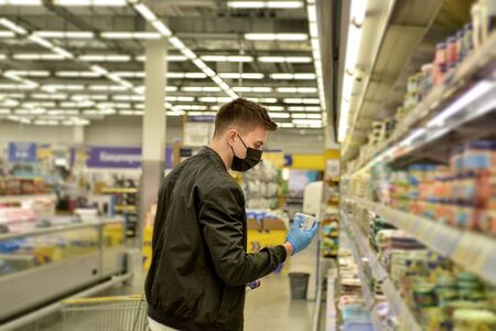 Man with face mask and rubber gloveの写真素材