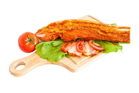 Pork fillet on wood, arranged and isolated on whiteの写真素材