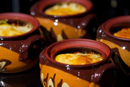 Stew pot with sausage and cheeseの写真素材