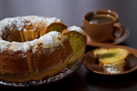 Round cake with sugar top and coffee  Traditional cuisine の写真素材
