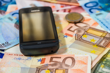 Phone on money notesの写真素材