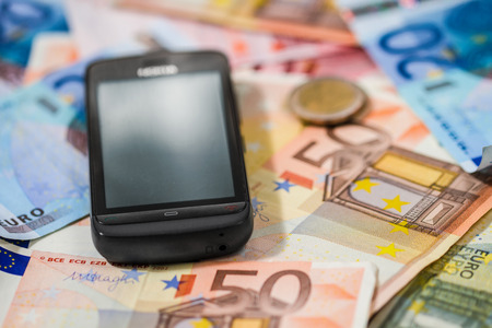 Phone on money notesの写真素材