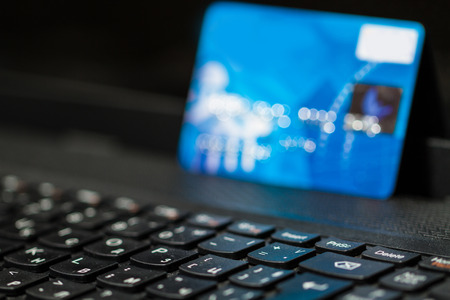 credit card on the keyboardの写真素材