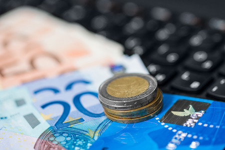 Money on keyboard of computerの写真素材