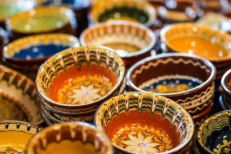 Close up old flower clay pot in marketの写真素材