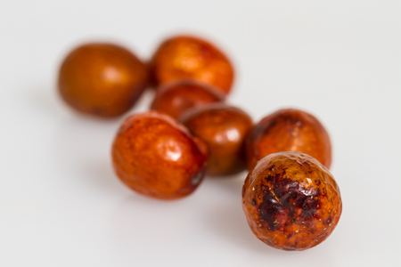 Chinese jujubes isolated on white background. Herbal food for heathy eating.の写真素材