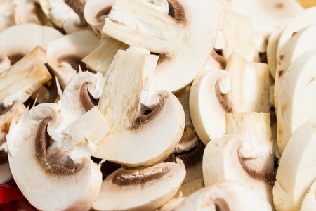 Sliced mushrooms texture prepared for cooking. Ready to be cooked.の写真素材