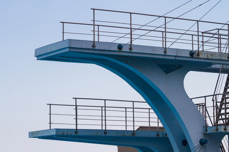 Diving platform from the side with a blue skyの写真素材