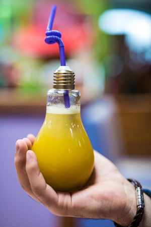 Eco and bio juice in glass bulb. Concept idea.の写真素材