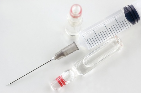 Close-up of Ampules with Syringeの写真素材