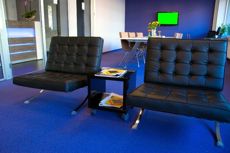 Conference and meeting room (green color on the TV can be replaced with your picture)の写真素材