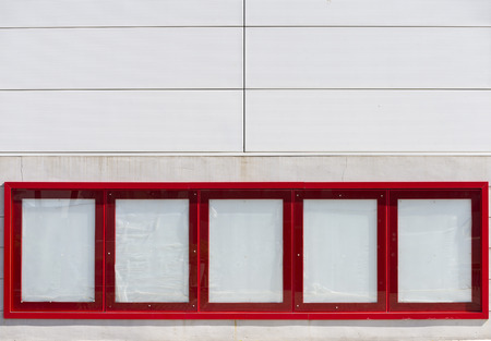 Red empty advertising ads on the front of shopping centerの写真素材