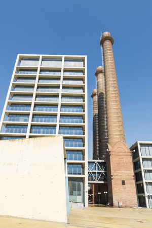 The three fireplaces located in the Parallel Avenue, symbol of the industrial past of the city of Barcelona, Catalonia, Spain.のeditorial素材