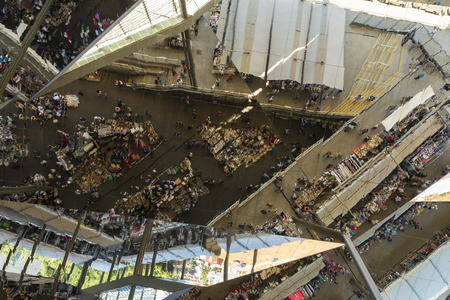 Barcelona, Spain - June 18, 2014  Unidentified people and market stalls reflected on a mirror ceiling of the most famous flea market in Barcelona, also known as Els Encants or Els Encants Vells, located in Glories neighborhood  Unidentified people and marのeditorial素材