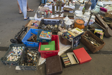 Barcelona, Spain - June 18, 2014  Objects used, artwork and ornaments on a market stall in the most famous flea market in Barcelona, also known as Els Encants or Els Encants Vells, located in Glories neighborhood Objects used, furniture, artwork and ornamのeditorial素材