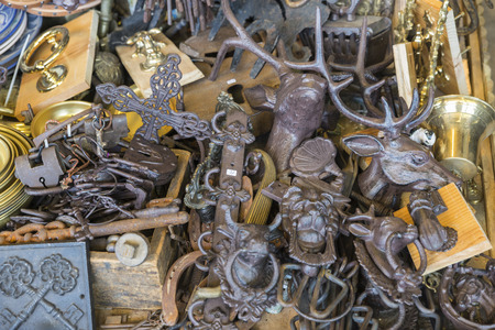 Barcelona, Spain - June 18, 2014  Objects used, keys and ornaments on a market stall in the most famous flea market in Barcelona, also known as Els Encants or Els Encants Vells, located in Glories neighborhood Objects used, furniture, artwork and ornamentのeditorial素材