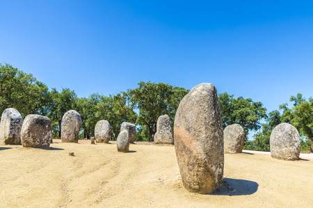 The Cromlech of the Almendres megalithic complex (or Almendres Cromlech), located near Évora, is the largest existing group of structured menhirs in the Iberian Peninsula, and one of the largest in Europeの写真素材