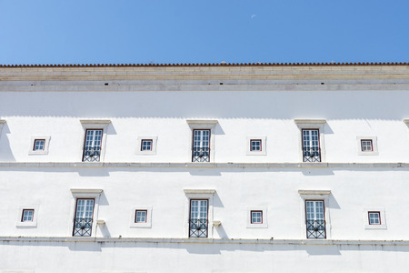 traditional building facade with characteristic balconies in Lisbon, Portugalの写真素材