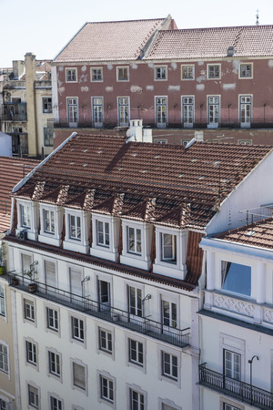 traditional building facade with characteristic balconies in Lisbon, Portugalの写真素材