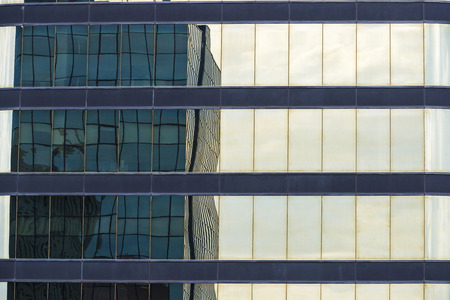 skyscraper reflected in a business district of Barcelonaの写真素材