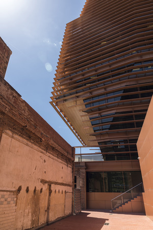 Skyscrapers in the new district office next to the Agbar Tower in Barcelona. Here parts of the old factories as heritage and history of the city are preservedのeditorial素材