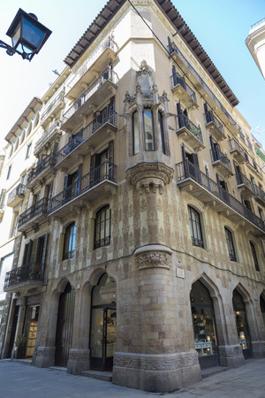 Barcelona, Spain - April 7, 2014: Residential building of Gothic Revival style in the PlaÃ§a de les Olles in Barcelonaのeditorial素材