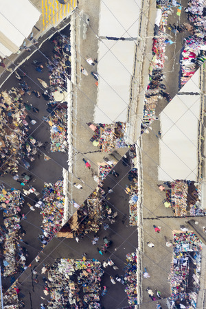 Barcelona, Spain - May 12, 2014: Unidentified people and market stalls reflected on a mirror ceiling of the most famous flea market in Barcelona, also known as Els Encants or Els Encants Vells, located in Glories neighborhood. 
Unidentified people and marのeditorial素材