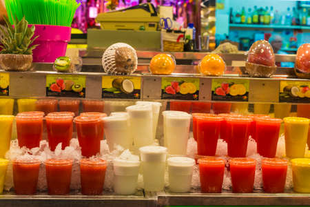 Barcelona, Spain - October 17, 2014: Fruit stand with smoothies ready to take on the market of La Boqueria in Barcelona, ââCatalonia, Spainのeditorial素材