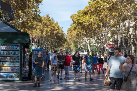 Barcelona, Spain - October 17, 2014:  People walking on Las Ramblas, the most popular street in Barcelona.のeditorial素材