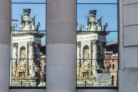 Double Reflection the monument of the Placa de Espanaの写真素材